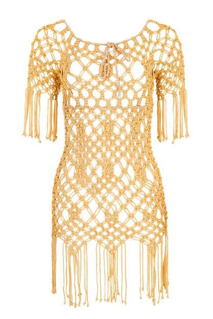 A handmade macramé dress in a rich mustard yellow color. The dress features intricate knot patterns with a loose, net-like design, short sleeves, and fringe details at the hem and sleeves. The back is tied with a delicate string for an adjustable fit, offering a bohemian and chic aesthetic.