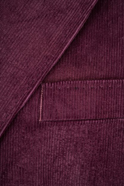 Women blazer in deep purple Italian corduroy fabric with a single-button closure and playful printed lining featuring dog illustrations